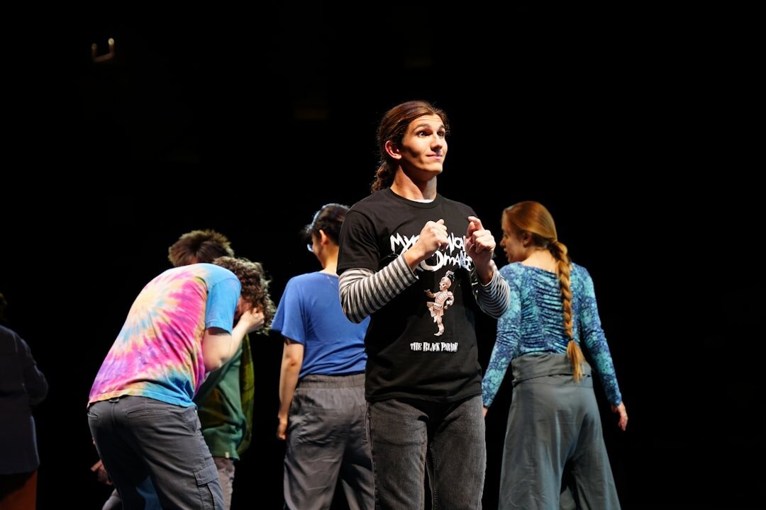 Acting teacher directing two students during a scene rehearsal