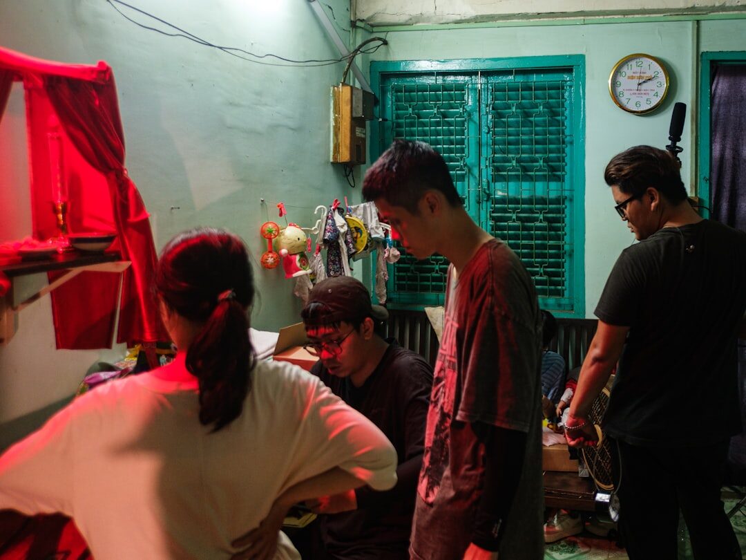 Group of students doing an improvisation exercise in a rehearsal room